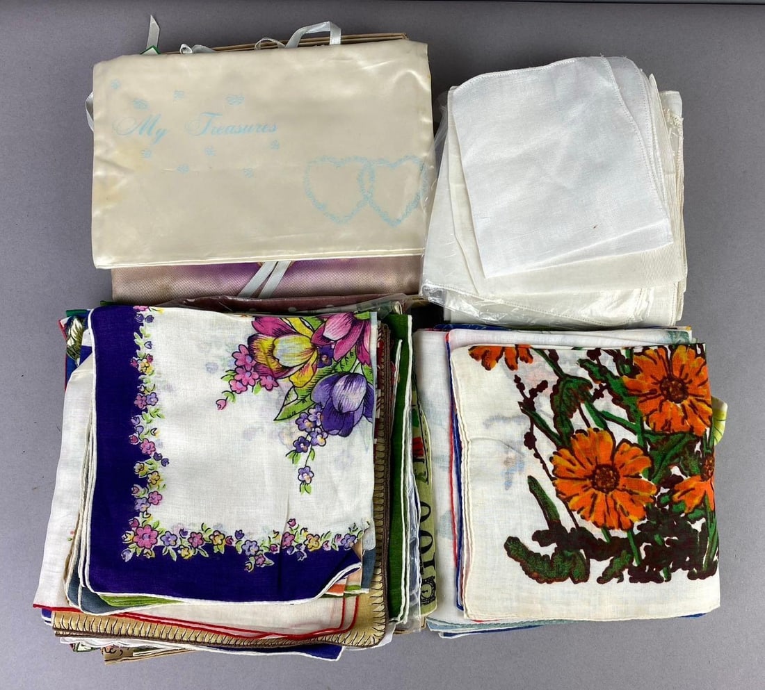 Group of Assorted Handkerchiefs: floral pattern designs. One measures L 10 x W 10 inches.