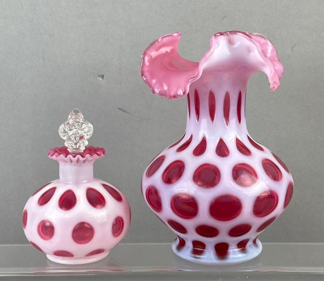 Group of 2 Fenton Cranberry Coin Dot Glassware: Largest measures 7 inches in length.