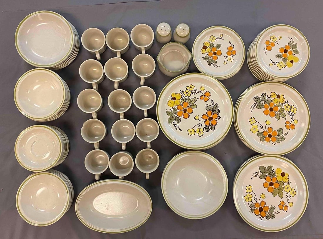 Big Group of Assorted Japan Harvest Collection Stoneware: Hand Painted Mountain Flowers Stoneware plates, bowls, and mugs. Chips and cracks throughout. Heavy. Largest measure 9 inches in diameter.