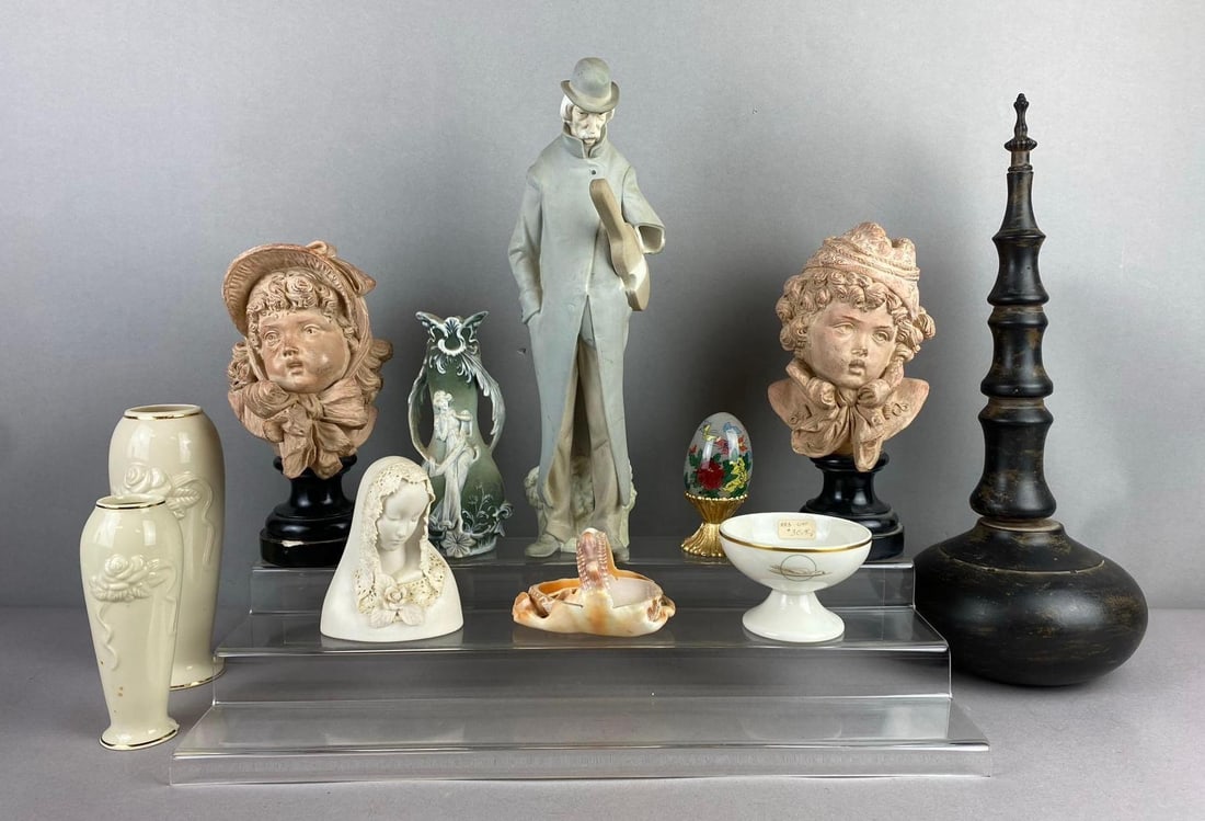 Group of Assorted Porcelain and More: Includes broken Lladro statue, busts, and more. Largest measures 10 inches tall. Stand not included.