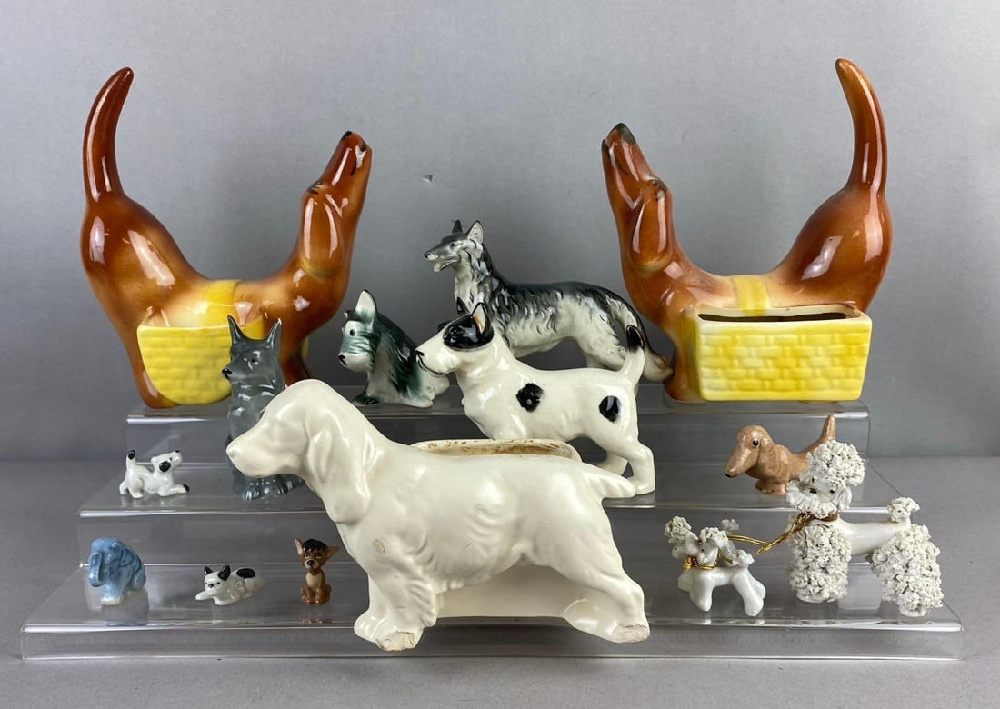 Group of Assorted porcelain Dog Figurines and More: includes wiener Dogs, wolves, and more. Largest measure 5 inches in length. Stand not included. Some chips and cracks