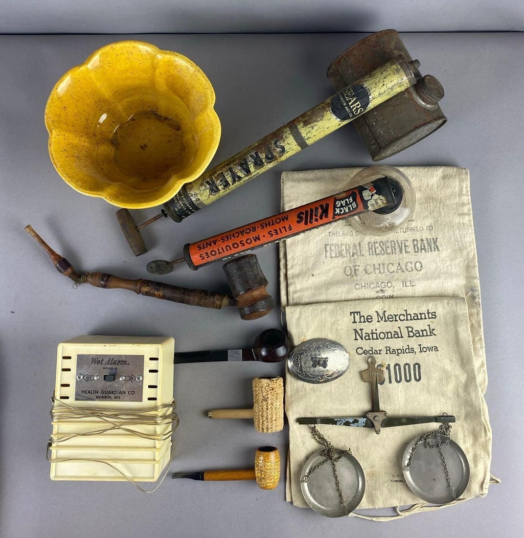 Group of Assorted Vintage Americana and More: Includes corn Cob Pipes, National Bank Money Bags, and more. Largest item measures 13 inches in length.
