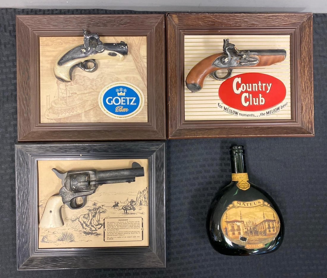 Group of 4 Beer Advertising Pistol Display and More: Includes Vintage Mateus Rose Still Wine Bottle. One gun display is broken. Largest measures L 12 x W 10 inches.