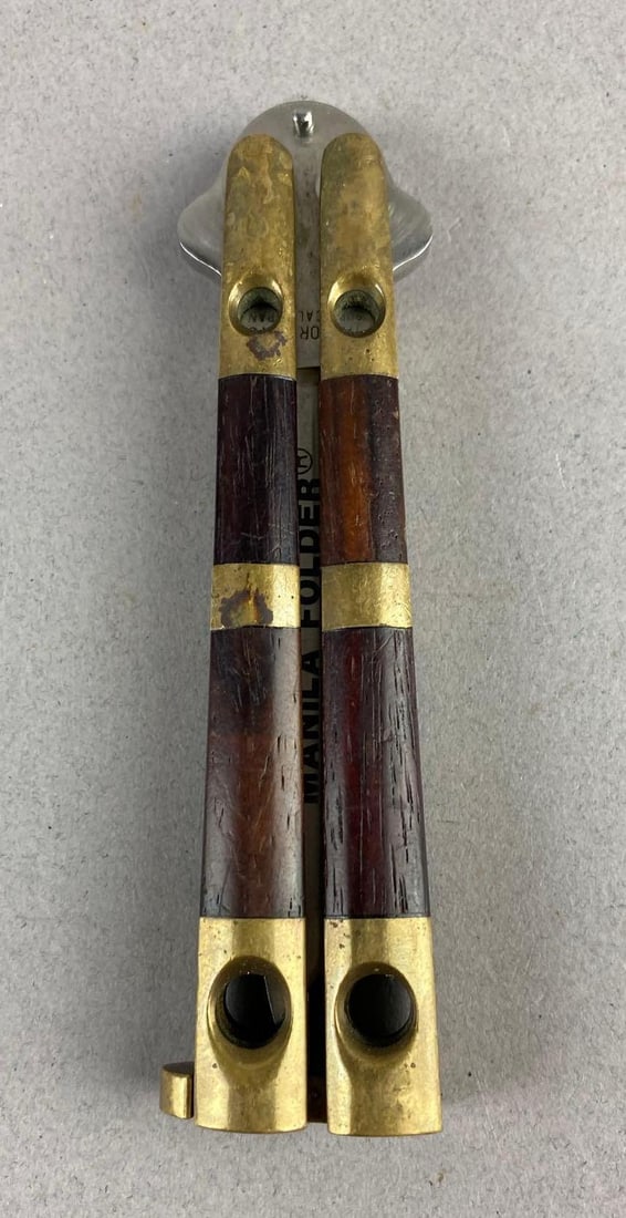 Vintage Taylor/ Seto Manila Folder Balisong: Measure 7 1/2 when extended. Blade measure 2 1/2 inches.