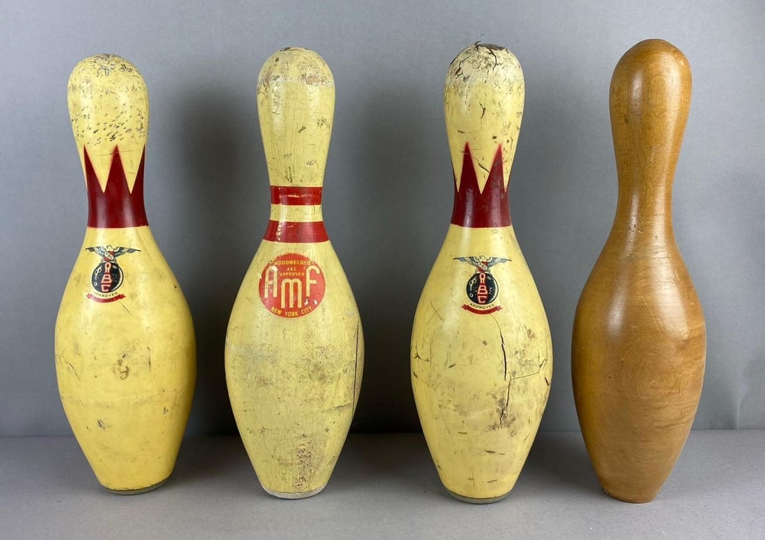 Group of 4 Vintage 1960s Brunswick Bowling Pins and More: One measures 15 inches tall. Has cracks and chips.