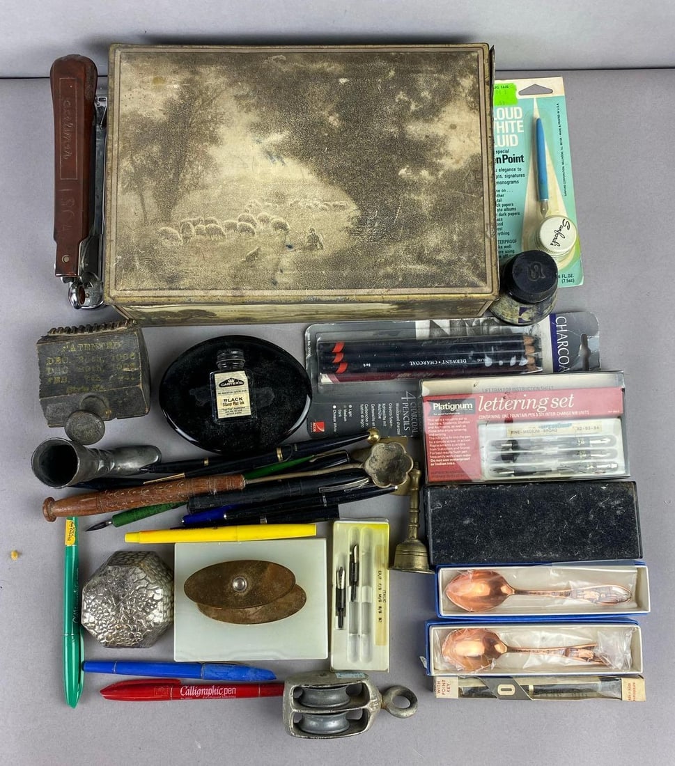 Group of Assorted Calligraphy Pens and More: Includes paperweights, ink, and more. Largest measures H 3 x W 8 x L 11 inches.