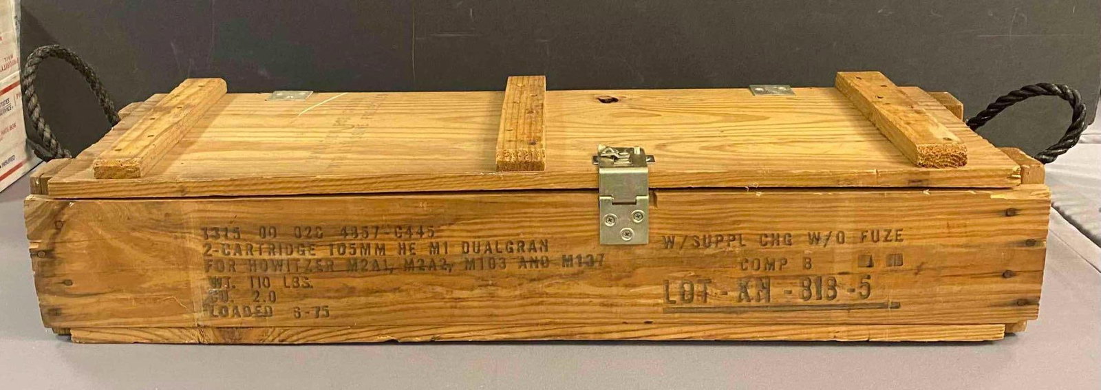 Vintage 105mm High Explosive Wood Ammunition Crate: Measures H 7 x W 12 x L 37 inches. No in house Shipping. Third party recommended.