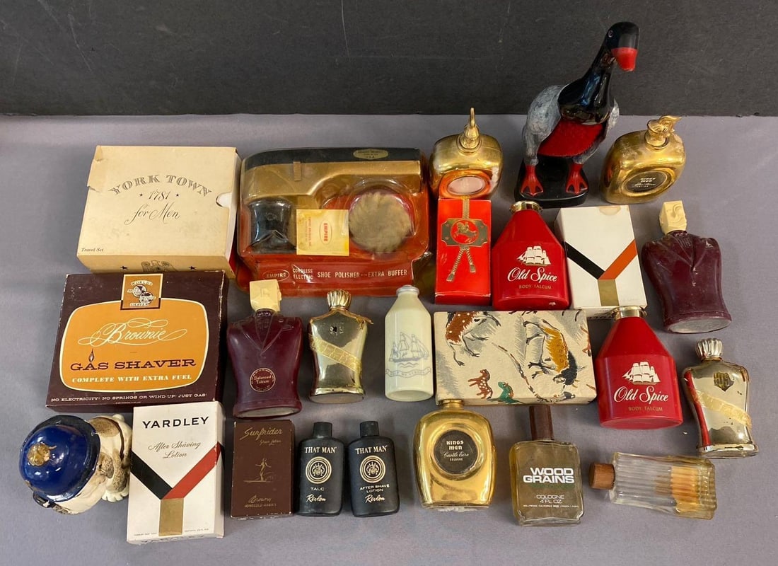 Group of Assorted Vintage Toiletries and More: Includes shoe Polish, empty and full perfumes, and more. Largest measures 10 inches tall.