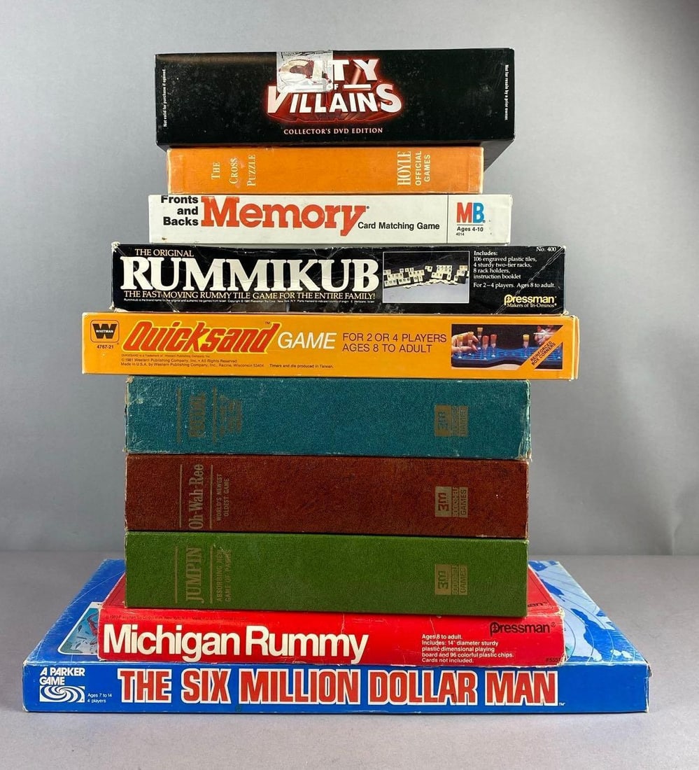 Group of Assorted Vintage Board Games: Unknown completion. Includes The Six million dollar man, Quicksand, and more. Largest measures L 18 x W 9 inches.