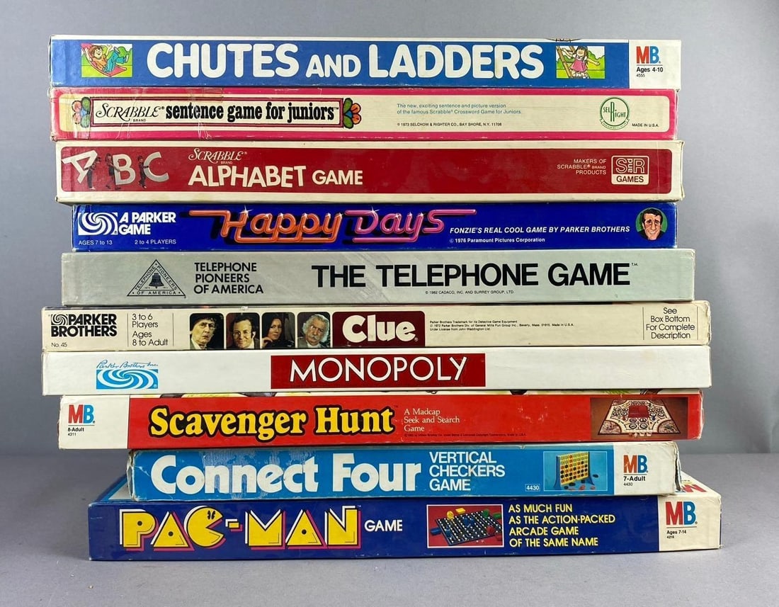 Group of Assorted Vintage Board Games: Includes Monopoly, Connect 4, and more. Unknown completion. Largest measures L 19 x W 10 inches.