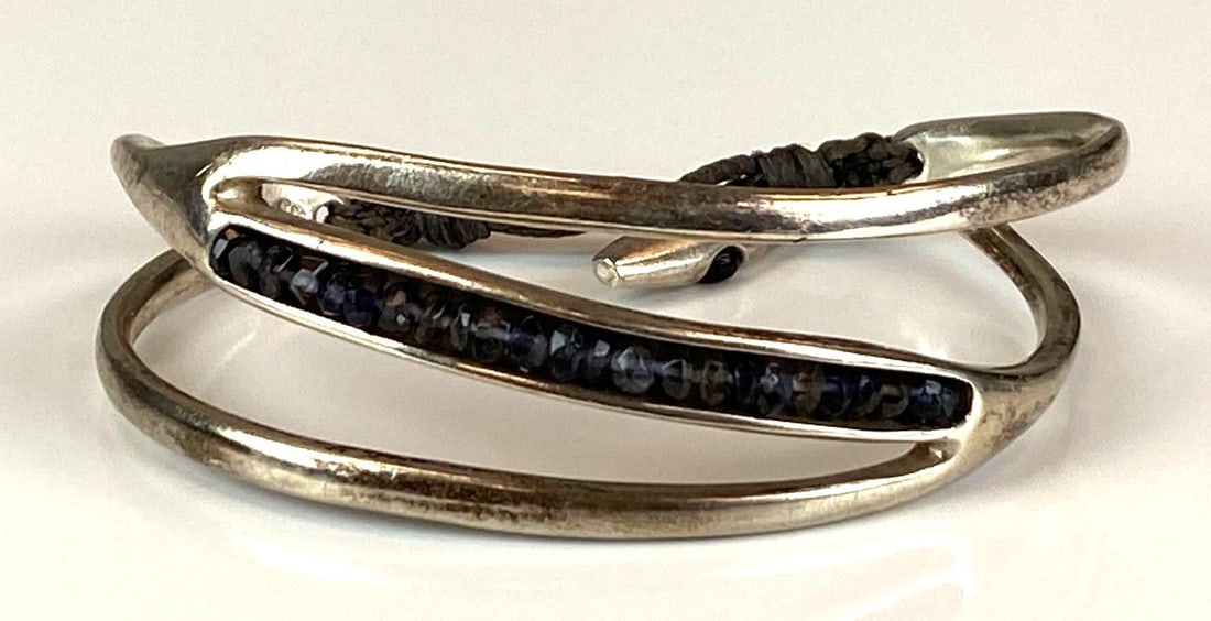 Sterling Silver Purple Rhinestone Cuff Bracelet: Measures 1 3/4 inches H x 2 1/2 inches W