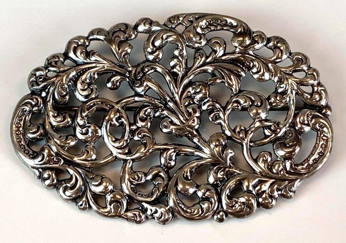 Michele Signed Sterling Silver Openwork Floral Brooch: Measures 1 1/2 inches H x 2 1/2 inches W