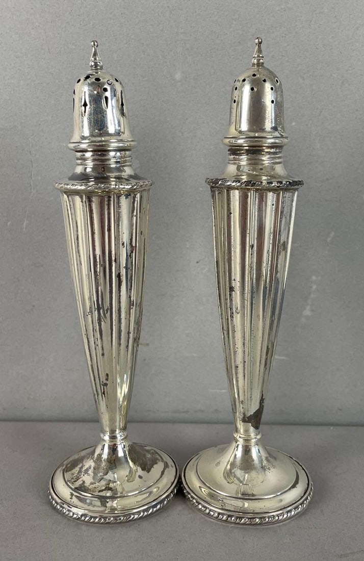 Pair of Vintage Weighted Sterling Silver Salt and Pepper Shakers: Each measure 7 inches x 2 inches