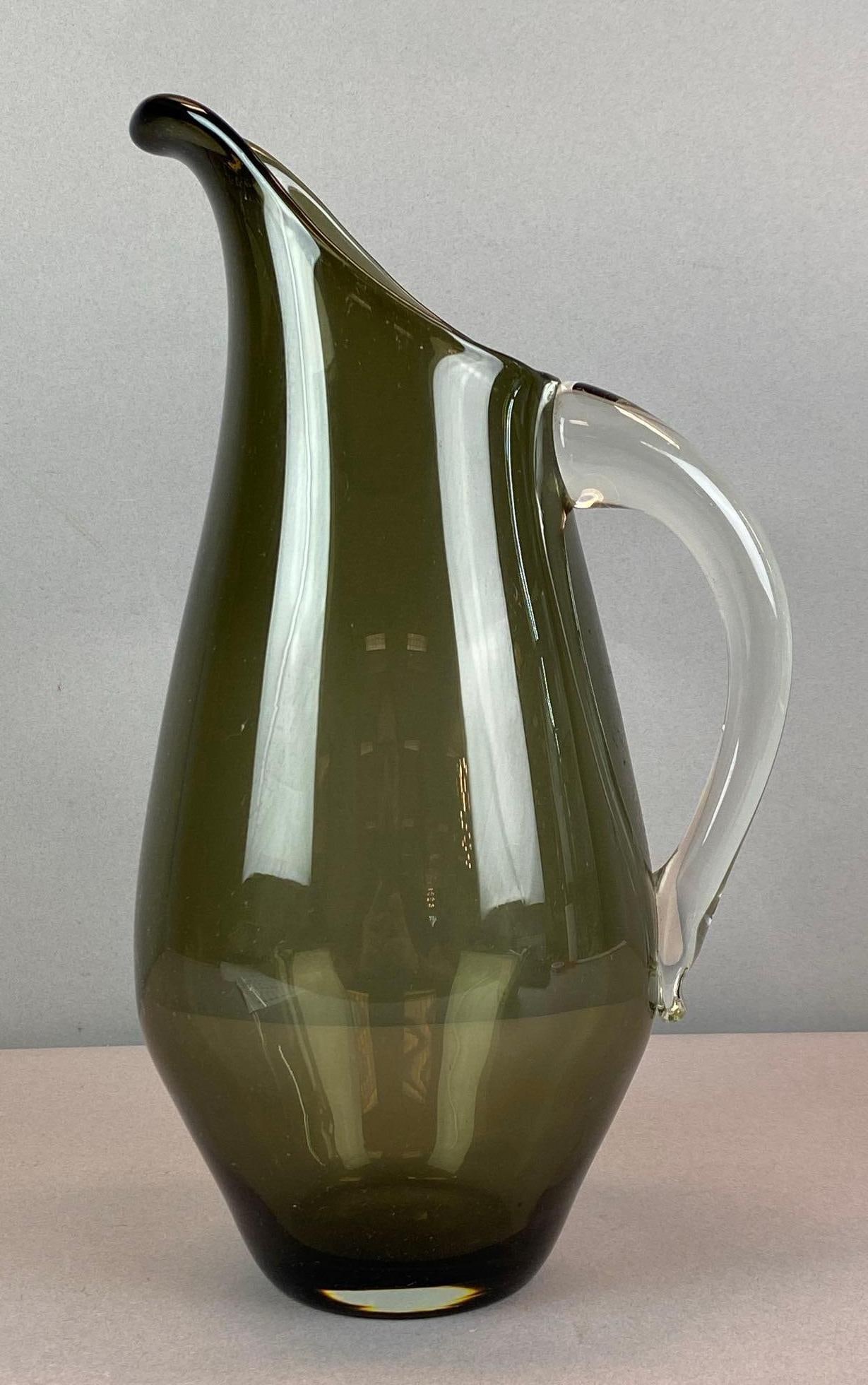 Erickson Glass Vintage MCM Smoke Art Glass Pitcher: etched Signed Erickson on base, mid century modern, faceted pontil mark shown, measures 13 1/2 inches H x 7 inches W x 6 inches D