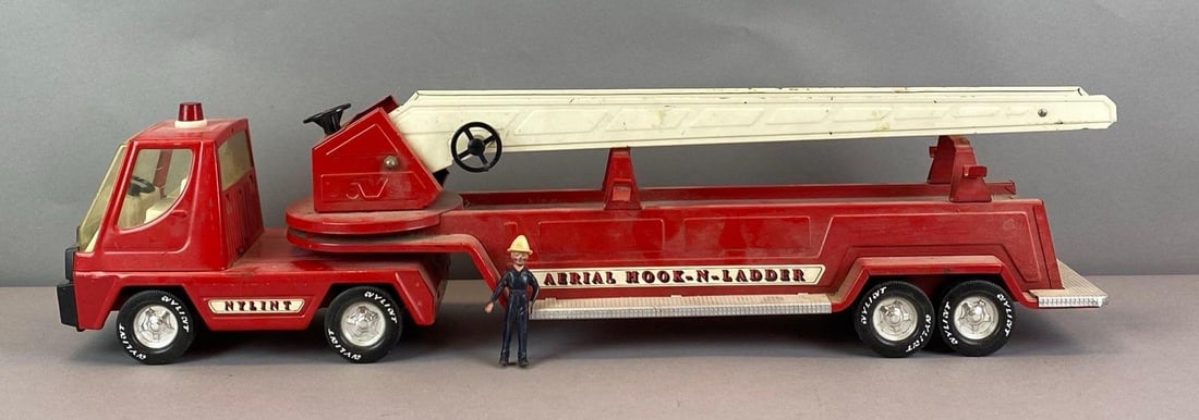 Vintage Pressed Steel Aerial Hook-N-Ladder Firetruck: Some paint wear, Needs cleaning, measures 7 1/2 inches H x 6 inches W x 31 inches D
