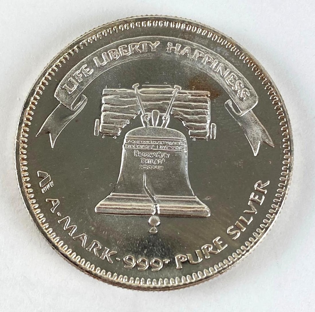 1985 A-Mark Liberty Silver 1 oz .999 Fine Silver Round (1 of 2)