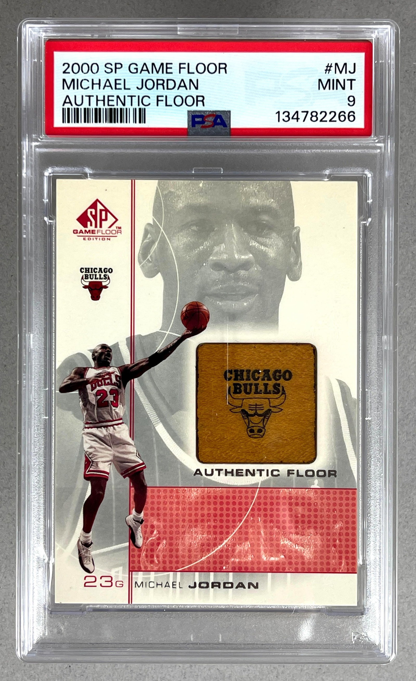2000 SP Game Floor Authentic Floor Michael Jordan #MJ PSA 9: 2000 Sp Game Floor Authentic Floor Michael Jordan #MJ PSA 9, Plastic case scratched, Newly Graded
