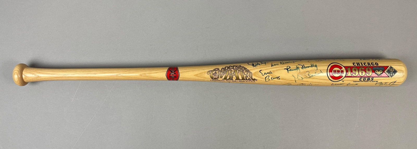 Rare 1969 Chicago Cubs Team Signed Bat with 17 Autos 163/169: Autographed Include Ernie Banks, Ron Santo, Billy Williams, Fergie Jenkins, and More, Full details in final photo, Case included, Minor cracks in case, Measures 36 x 5 x 4 1/2 Inches, Bat measures 34 