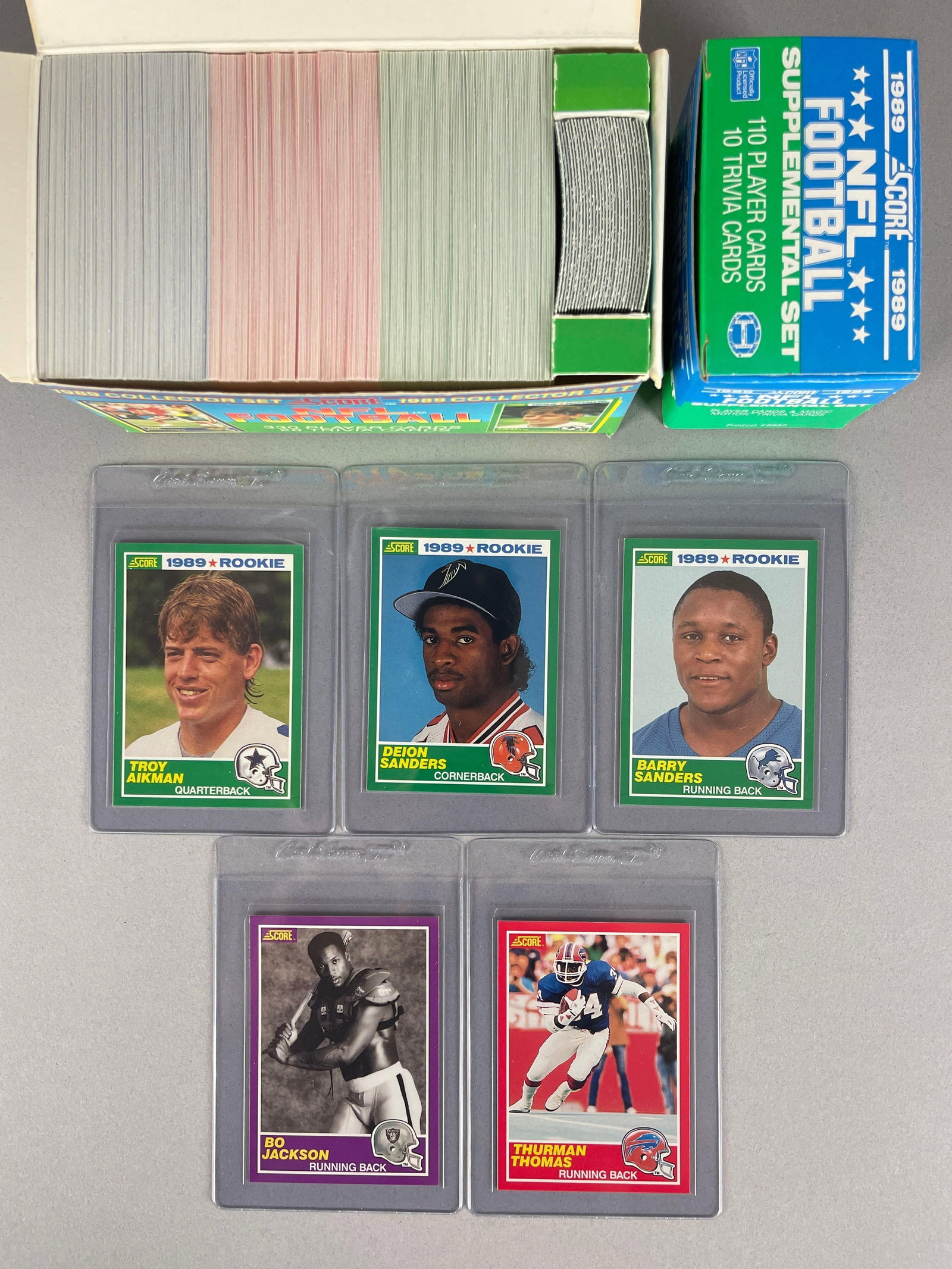 1989 Score Football and Supplemental High-Grade Factory Sets: Conditions vary, NM - Mint, Some cards ready to Grade, Includes Barry and Deion Sanders, Troy Aikmen, and Bo. Jackson Rookies