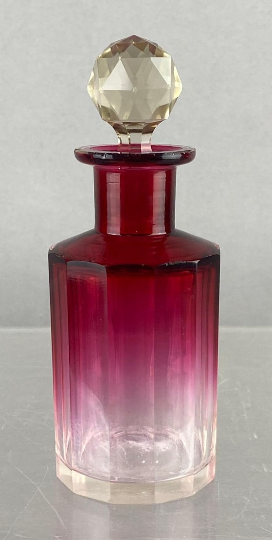 Antique French Art Nouveau Cranberry Red Crystal Perfume Bottle: Circa 1900s. Measures 16 inches tall. Small chip near bottom.