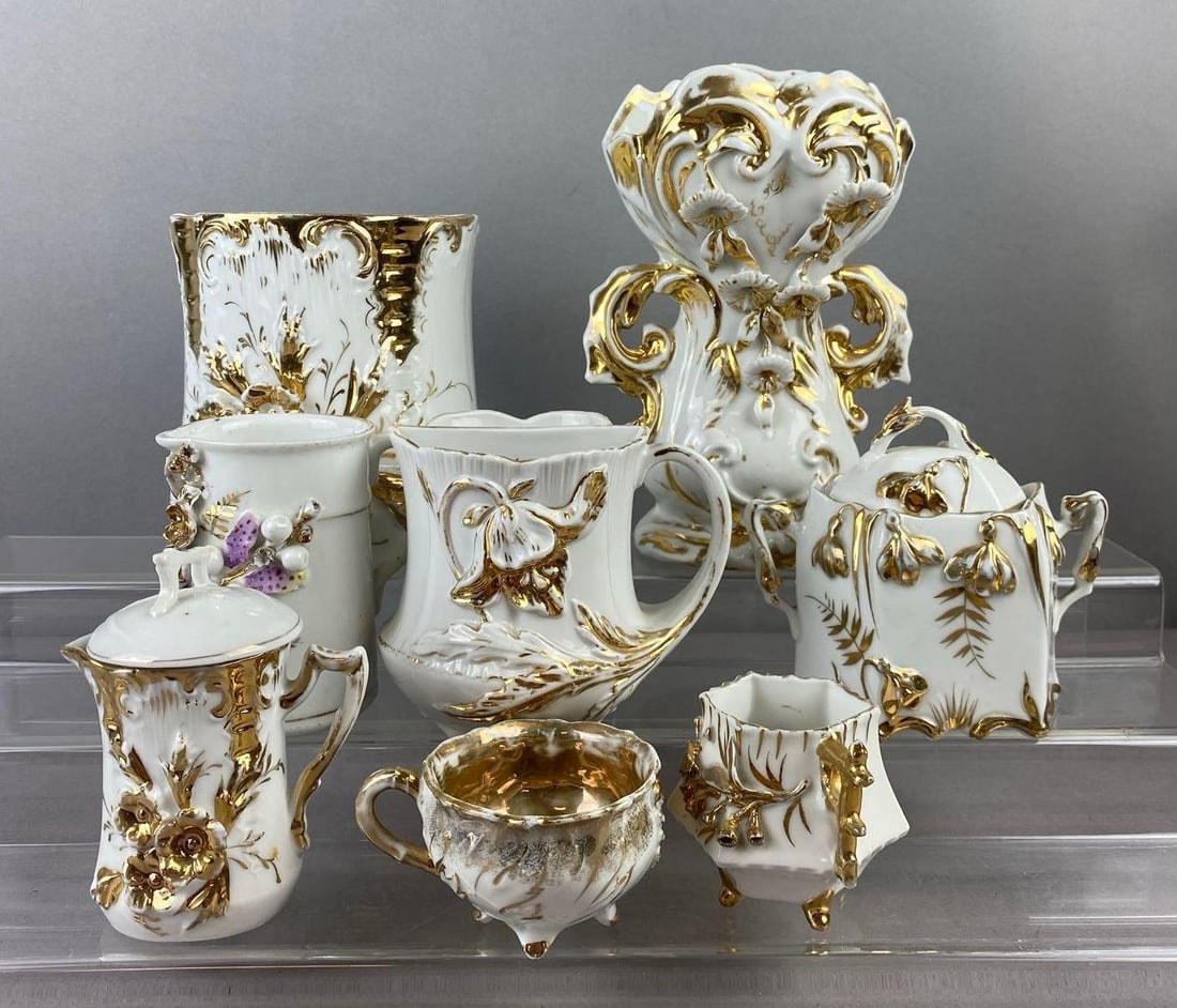 Group of Antique White Gold Tone Porcelain Teacups and More: Largest measure 8 inches tall.