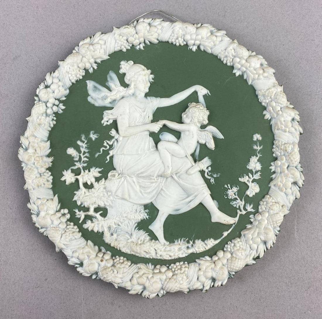 Antique Schafer and Vater Green Jasper-ware Cupid Plaque: Measure ls 7 inches in diameter.