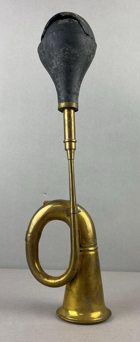 Antique Brass Bulb Car Horn: Broken Rubber. Measures 17 inches in length.