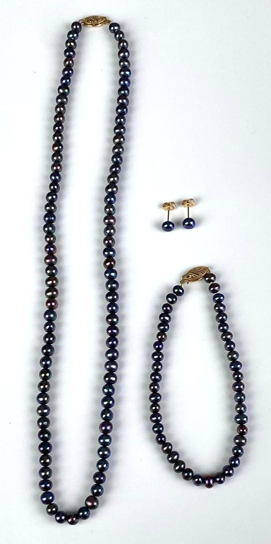 Group of 14K Yellow Gold Pearl Jewelry: includes pair of stud earrings, necklace and bracelet, necklace measures 18 inches in length
