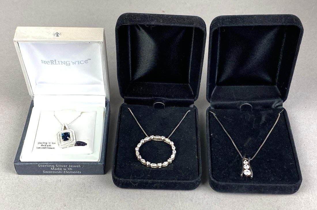 Group of 3 Sterling Silver Necklaces with CZ Pendants: 1 with original box, longest measures 18 inches in length