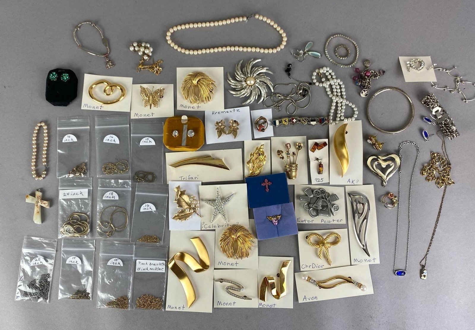 Group of Assorted Costume Jewelry: Includes necklaces, brooches, pendants and more, largest measures 18 inches in length