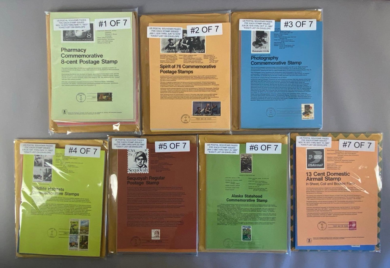 Group of 1970s - 1980s US Postal Stamp Souvenir Pages: All bagged, each measures 12 inches H x 9 inches W