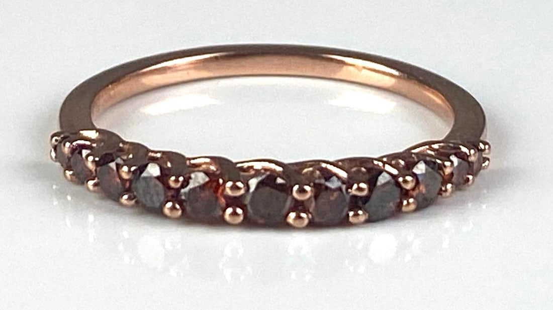 Signed 14K Rose Gold Brown Diamond Ring: total weight of 1.6 grams, size 7