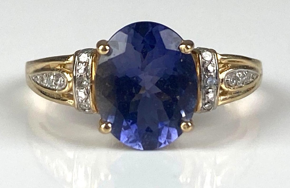 Signed 10K Yellow Gold Iolite Diamond Ring: total weight of 2.5 grams, size 7