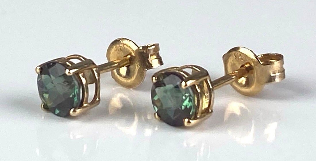 Pair of 14K Yellow Gold CZ Stud Earrings: Total weight of 0.9 grams, each measures 1/2 inches in length