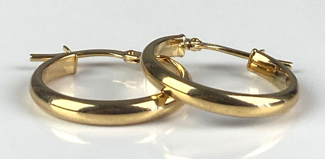 Pair of Italian 10k Yellow Gold Hoop Earrings: Total weight of 0.9 grams, each measures 3/4 inches H