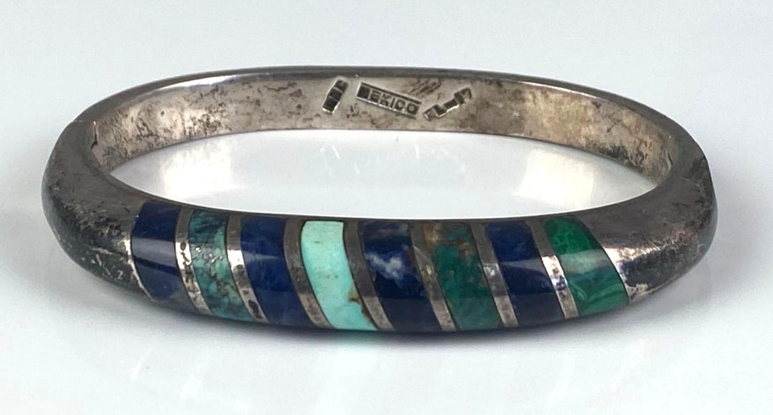Mexican Silver Multi-Stone Hinged Bangle: Marked 325, measures 2 1/4 inches H x 2 1/2 inches W