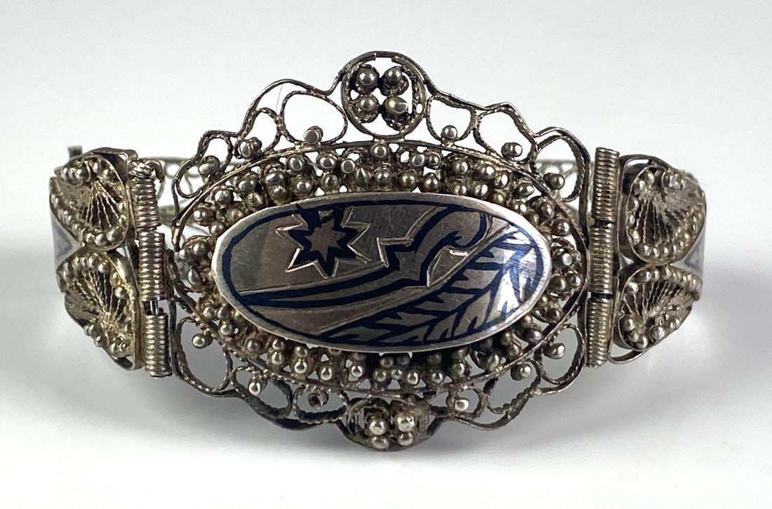 1944 Iranian Sterling Silver Openwork Hinged Cuff Bracelet: Measures 6 1/2 inches in length