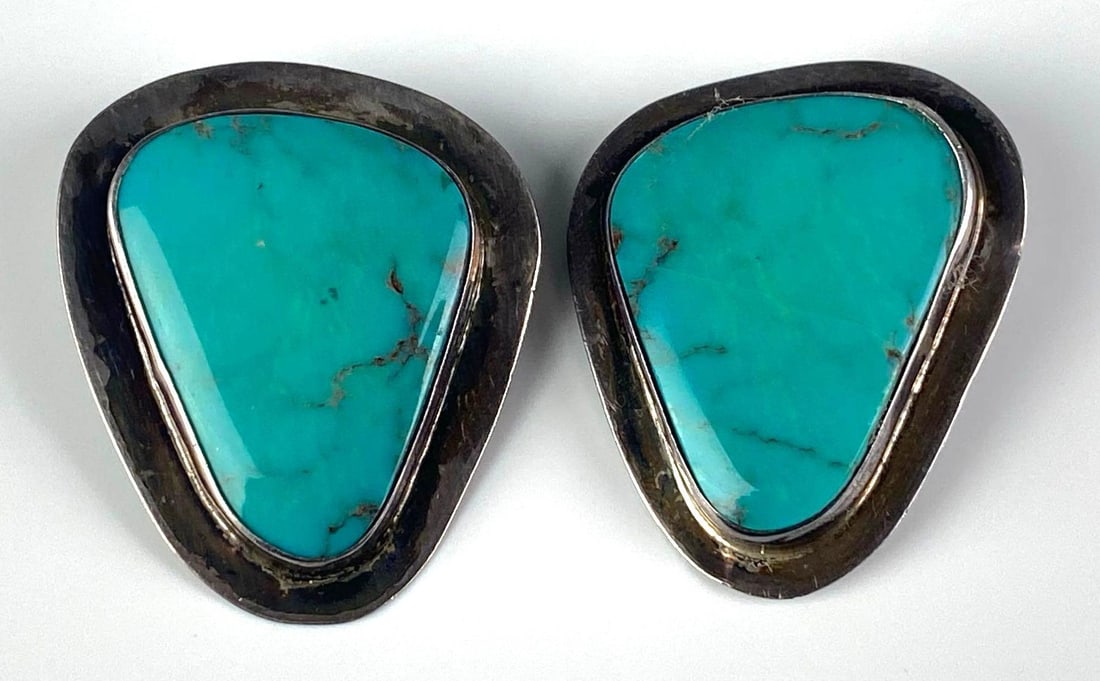 Pair of Sterling Silver Turquoise Clip Earrings: Each measures 1 1/2 inches H x 1 1/4 inches W