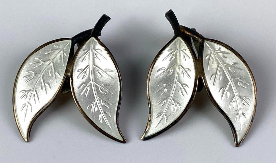 Pair of DA Signed Norwegian Sterling Silver Leaf Clip Earrings: Each measures 1 inches H x 1 inches W