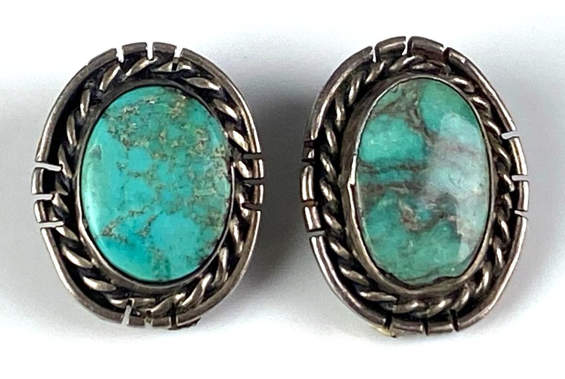 Pair of Native American Sterling Silver Turquoise Clip Earrings: Each measures 3/4 inches H x 1/2 inches W