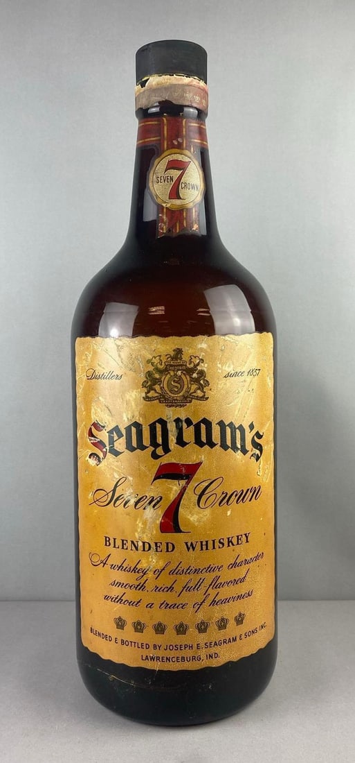 Vintage Seagram's Seven Crown Blended Whiskey 1 Gallon Bottle: Measure 28 inches. Has repaired Crack in bottle.