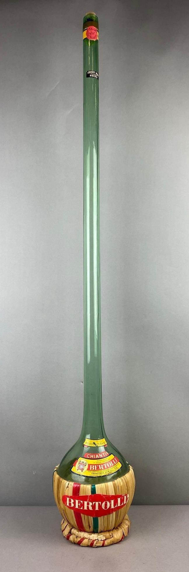 Vintage 1970s Italian Chianti Bertolli Fiasco Bottle: Measure 47 inches tall.