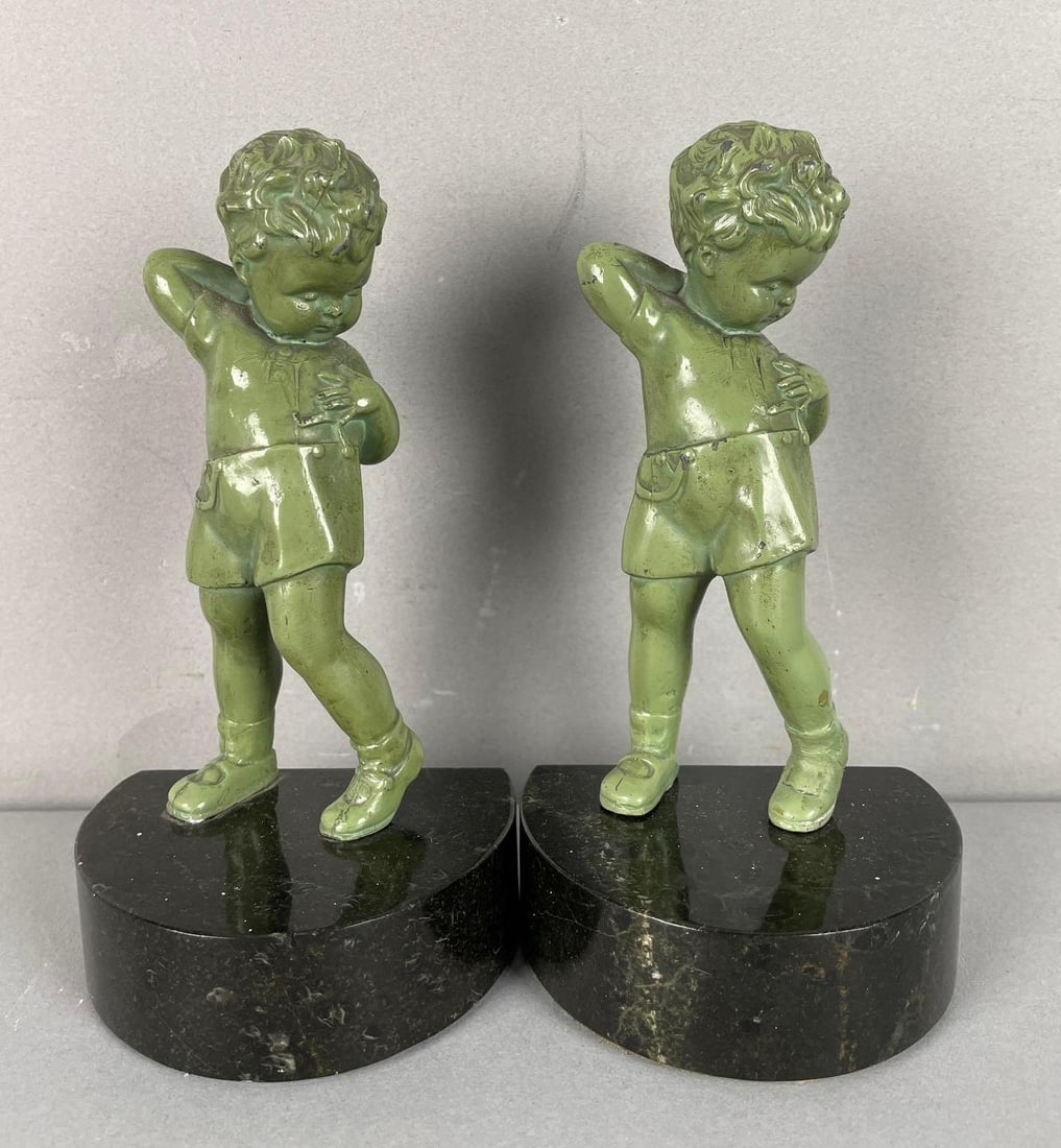 Pair of Vintage Young Boy Bookends: Marble base, each measure 7 inches x 3 3/4 inches x 2 3/4 inches