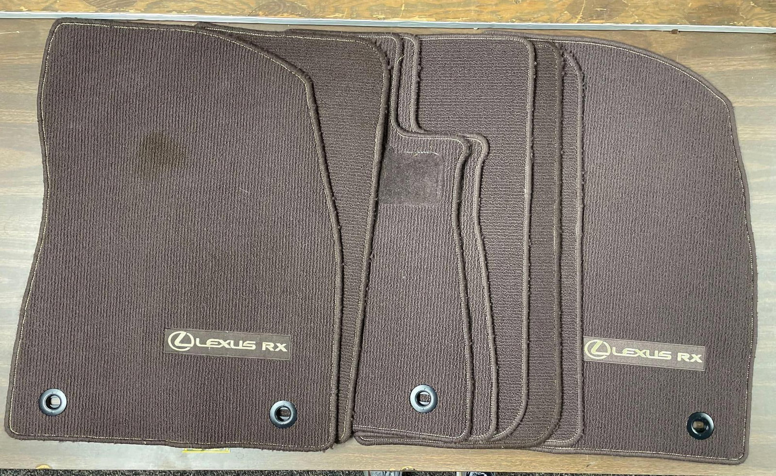 Group of Lexus RX Brown Floormats: Largest measures 27 inches x 21 inches