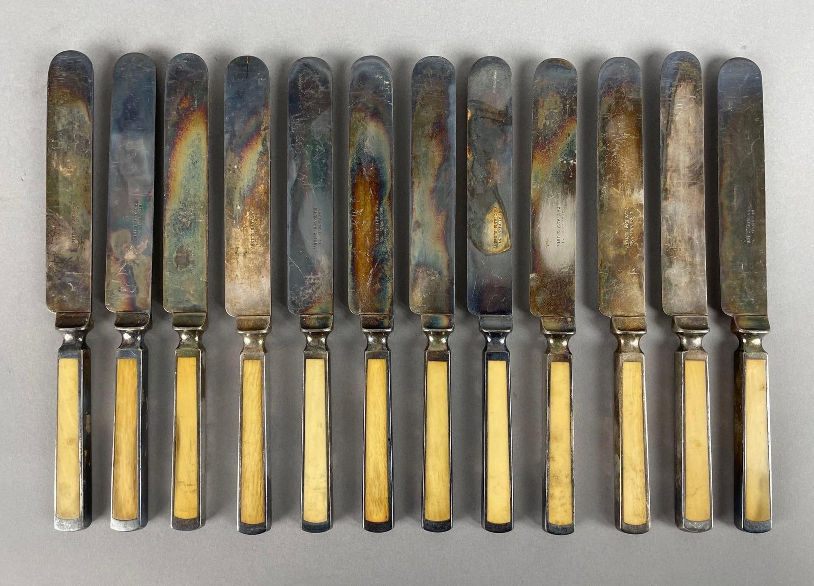 Set of 12 Antique Goodell Silver Plated Bone Handle Butter Knives: Patented 1867, measures 8 1/4 inches