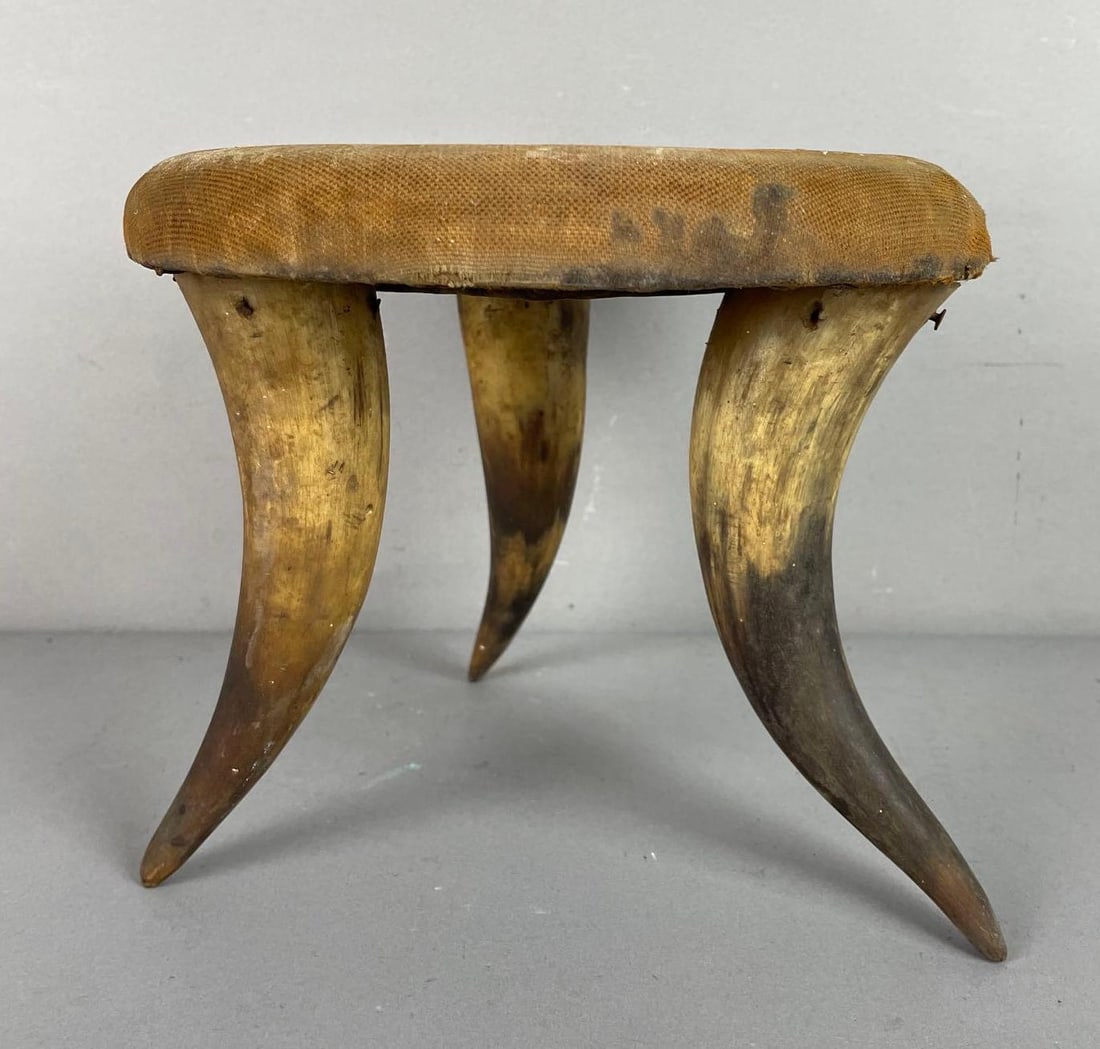 Victorian Steer Horn Cushioned Footstool: One leg needs reattached, measures 7 1/2 inches x 9 inches