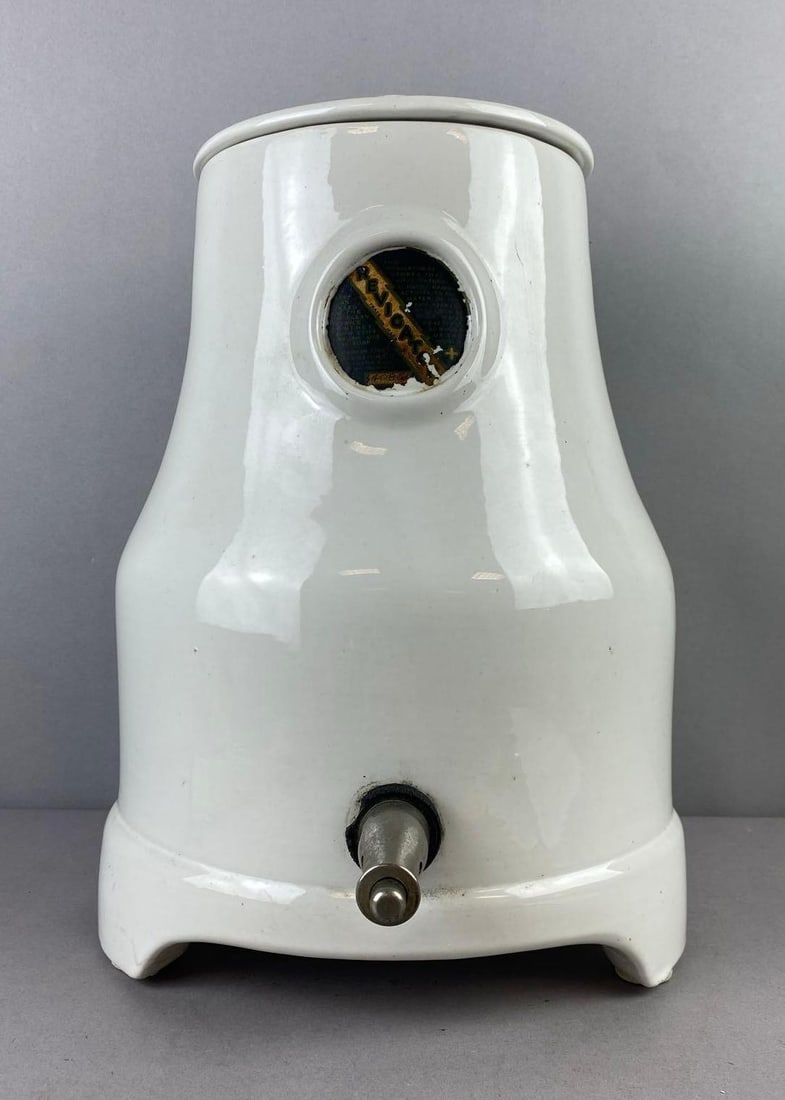 Antique 1920s Revigator Radon Water Despensor: Slightly radioactive. Measures H 14 x W 8 inches.