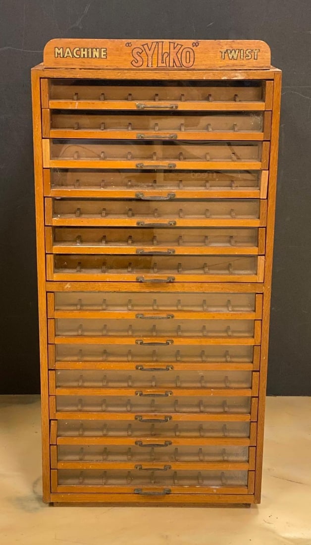 Vintage Sylko Machine Twist Wood Advertising Spool Cabinet: NO IN HOUSE SHIPPING AVAILABLE, THIRD PARTY SHIPPING RECOMMENDED, Measures 32 inches H x 15 inches W x 18 inches D