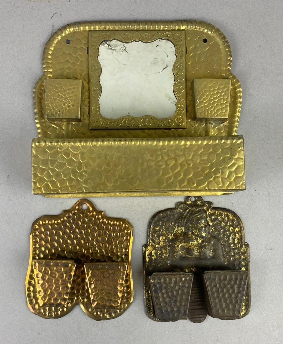 Group of 3 Vintage Pressed Brass Wall Hangers: Largest measures L 9 x W 7 inches.