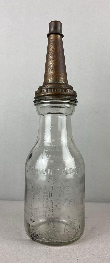 Vintage 1950s Duraglas 1 Qt Glass Motor Oil Bottle: Measures 13 1/2 inches.